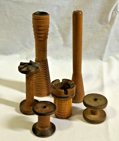 Antique Brown Sewing Empty Spools thumbnail