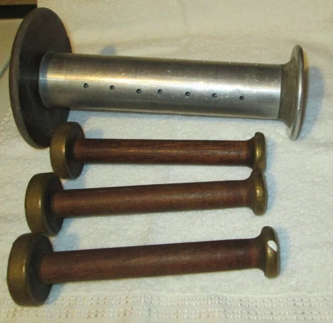 Antique Brown Sewing Empty Spools thumbnail