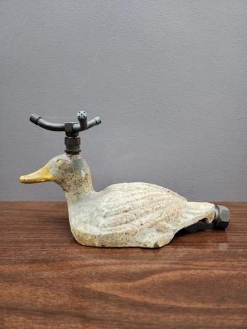 Antique Cast Iron Garden Sprinklers thumbnail