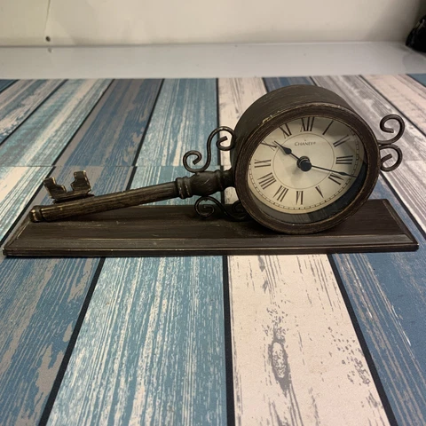 Antique Cast Iron Wall Clocks thumbnail