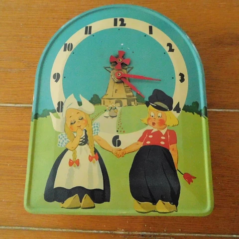 Antique Tin Wall Clocks thumbnail
